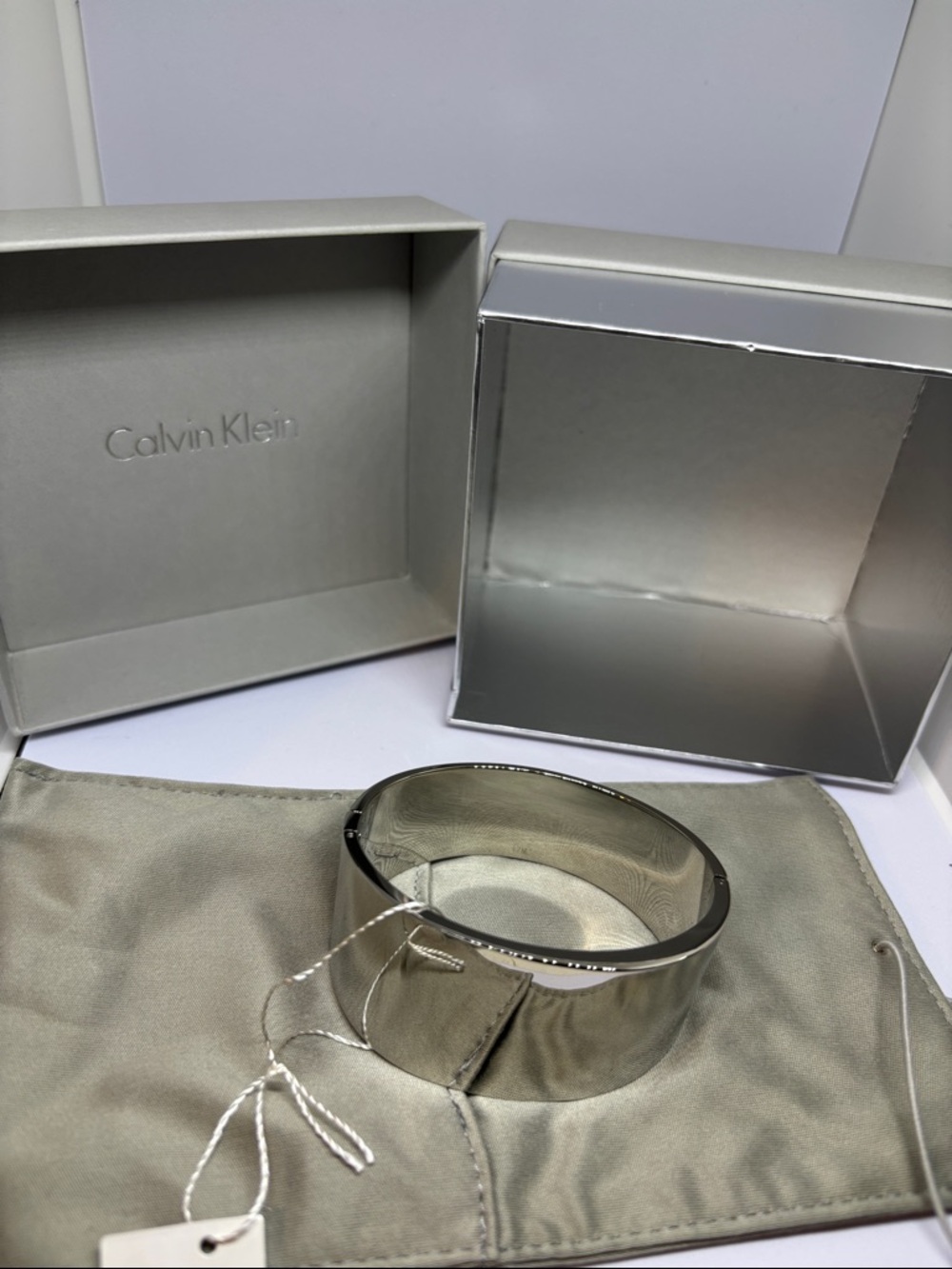 Calvin Klein Shiny Silver Cuff Bracelet with Branded Pouch